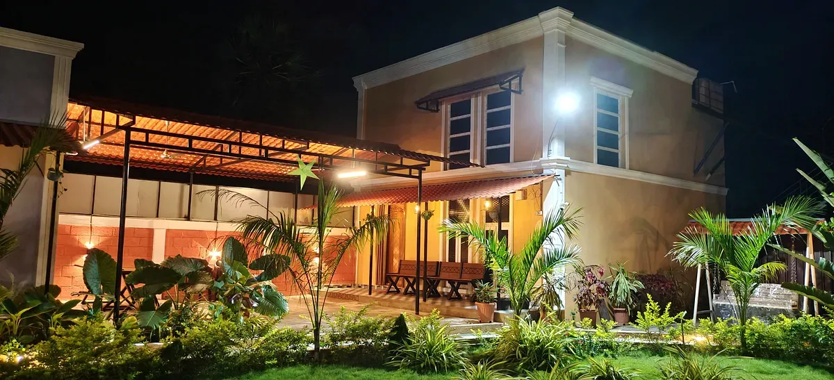 La Mithila Resort Pondicherry - suite outdoor dining area at night